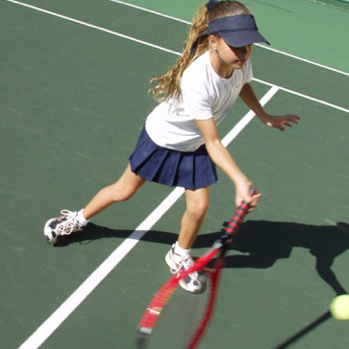 Young Girl Playing Tennis