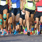 Long distance marathon runners racing
